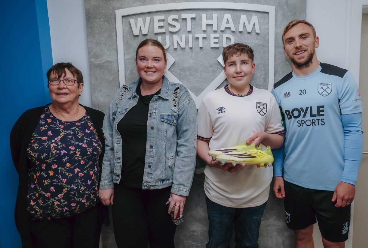 West Ham Superfan Freedie and family with Jarrod Bowen