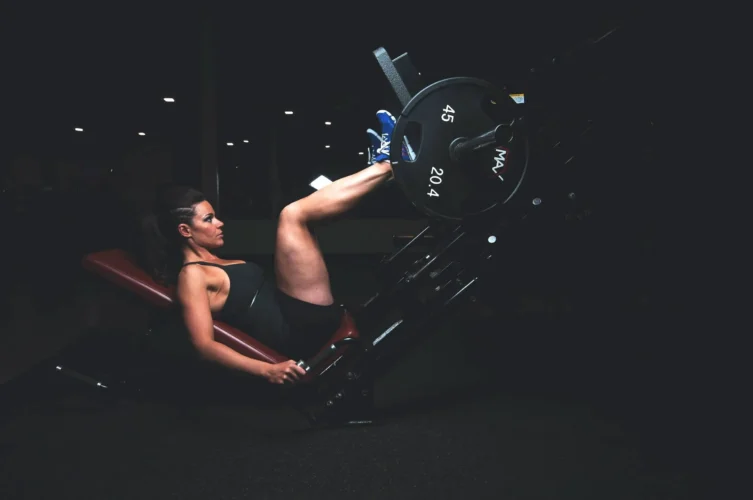Woman weight training at the gym