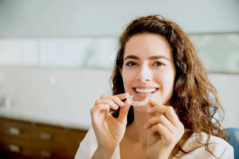 Woman with dental aligners