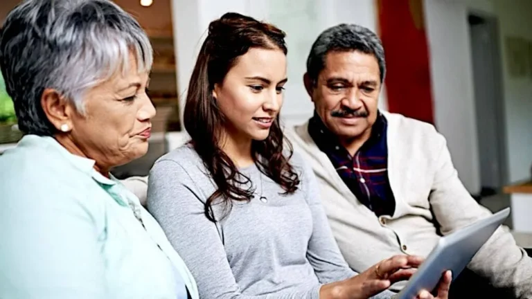 Family look at document on screen