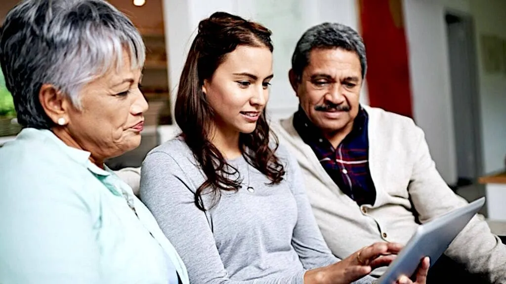 Family look at document on screen