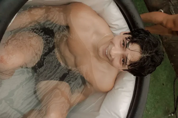 Young man in Ice Bath