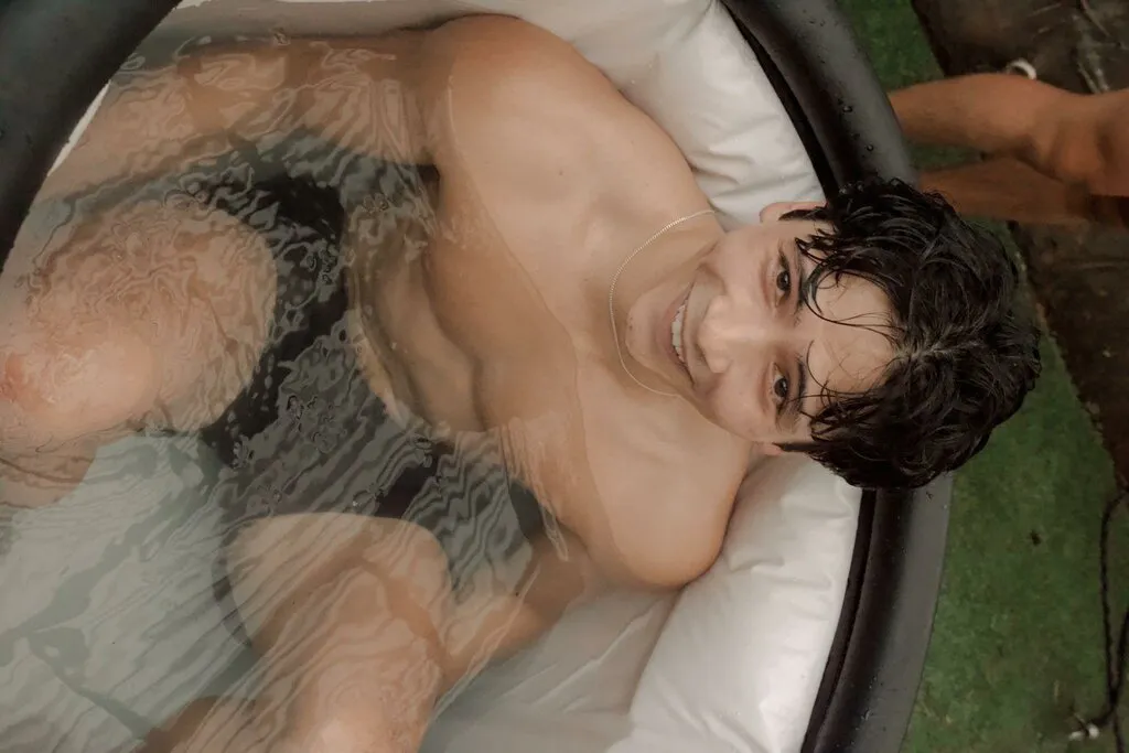 Young man in Ice Bath