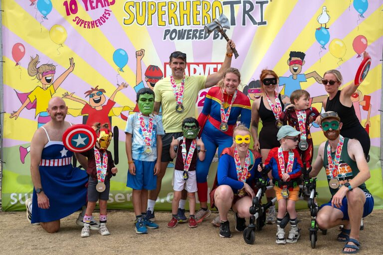 Photoboard celebration at the 2026 Superhero Tri, powered by Marvel