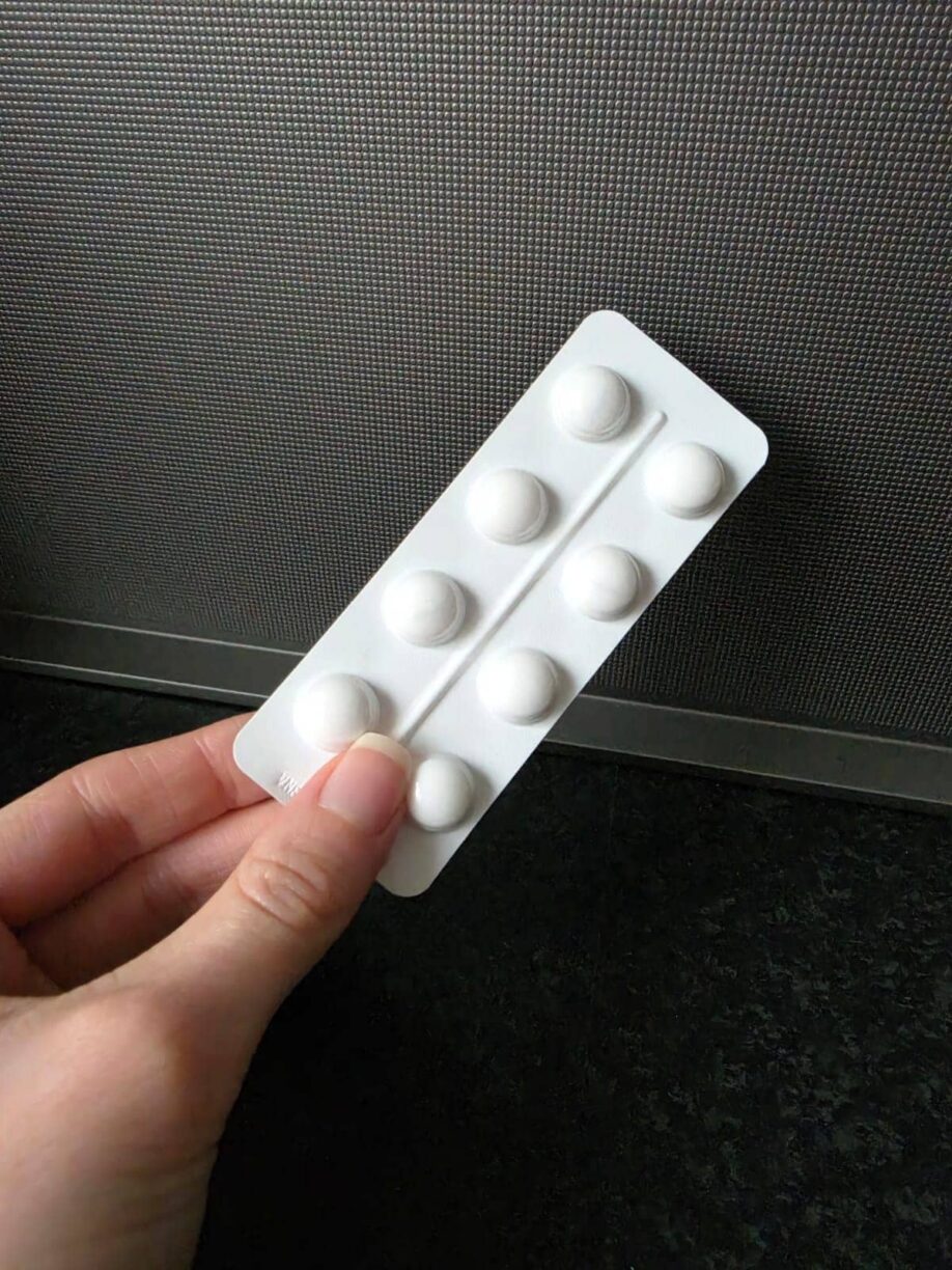 Hand holding tablets